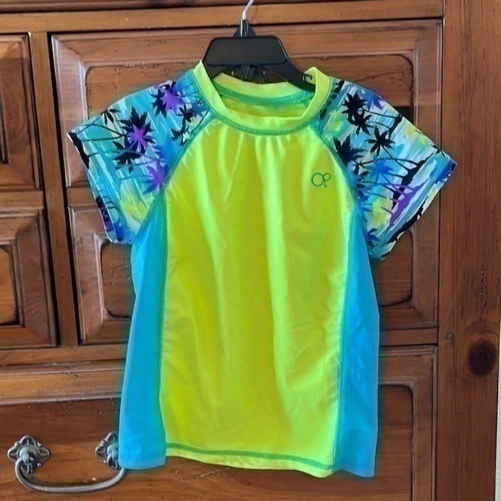 OP swim shirt size medium boy’s size 7-8 preloved